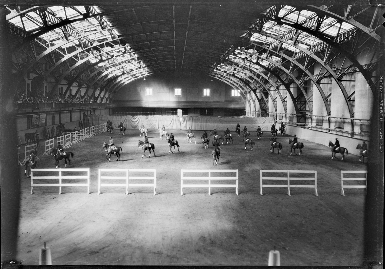 Mounted instruction inside the West Point riding hall